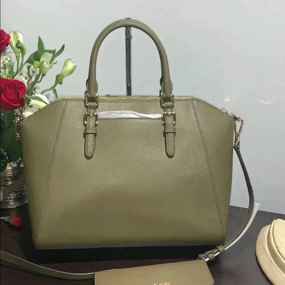 Michael Kors Ciara Duffle Solid olive green color